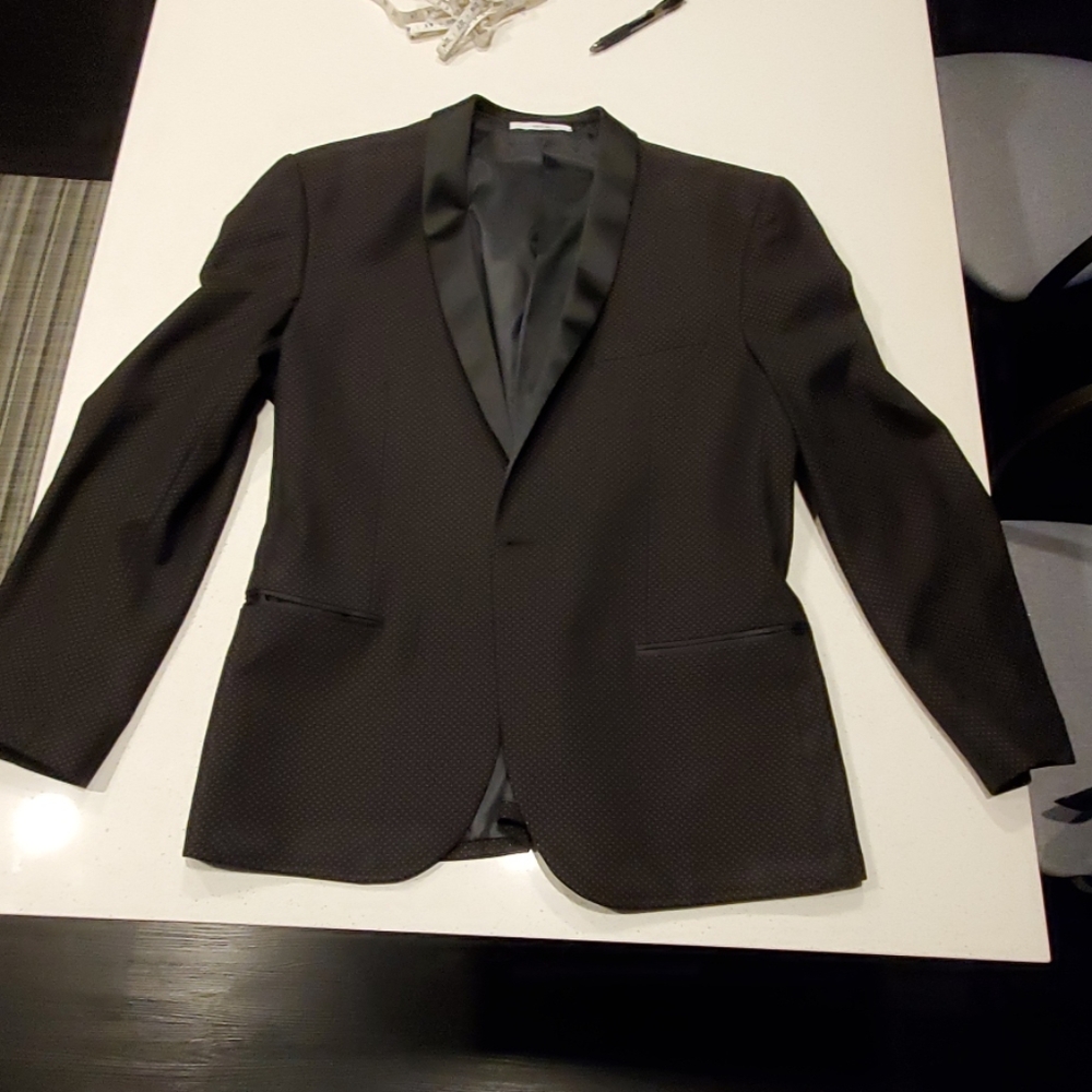 Classic dinner jacket, black with subtle pink dots
